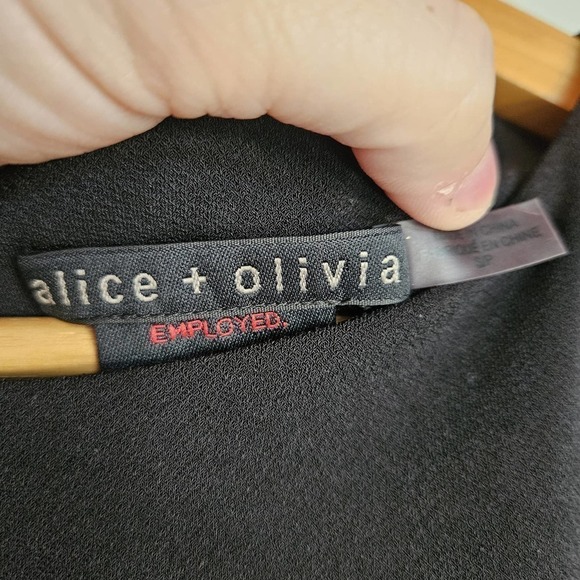 EUC Alice + Olivia Employed black peplum back‎ zip top Small Revolve - Picture 2 of 4